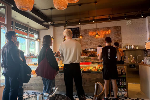 Customers queueing at a branch of Bridge Baker