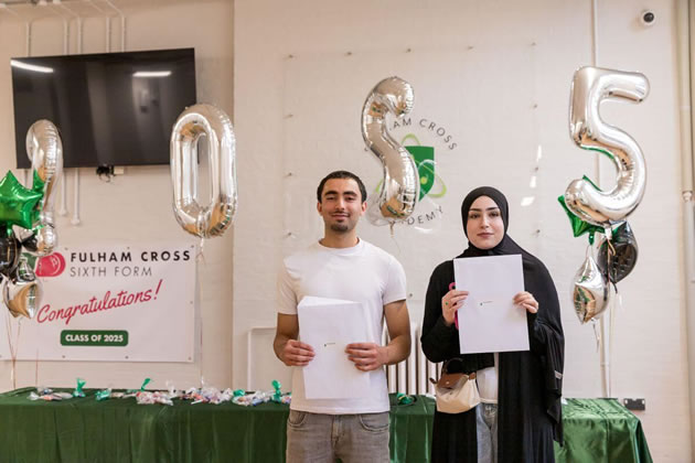 Mustafa (left) and Noura (right) collecting their A-level results from Fulham Cross Academy