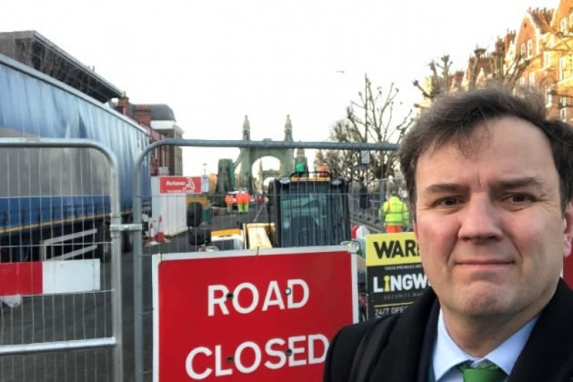 Greg Hands MP by Hammersmith Bridge 