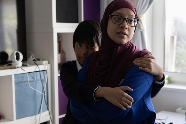 Kusum Begum with one of their children. Picture: Facundo Arrizabalaga/MyLondon